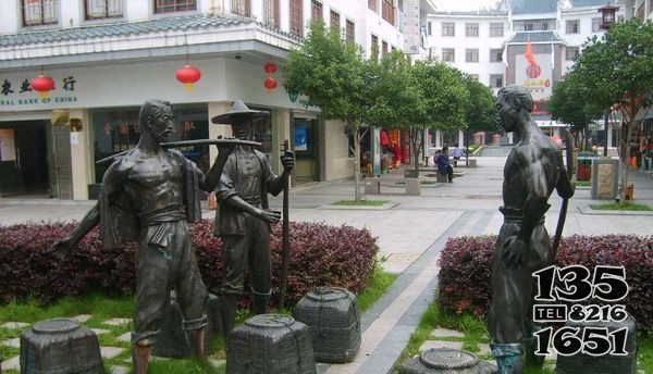 江鎮(zhèn)公園挑扁擔(dān)人物銅雕 圖片