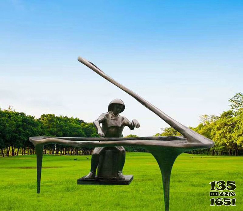 公園抽象彈鋼琴的小品銅雕 圖片