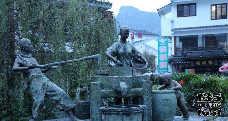 街邊磨豆子的一家三口人物小品銅雕 一家雕塑三口大道展會(huì)小說圖片