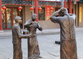 銅雕商業(yè)街民俗小品人物雕塑 