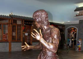 江鎮(zhèn)李小龍功夫巨星名人銅雕 李小龍雕塑作品詩句世紀(jì)漫畫